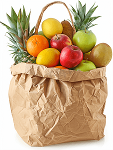 白色萝卜摄影照片_白色背景纸杂货袋中的水果蔬菜和产品