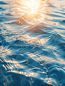 日出的风摄影照片_有波纹和阳光反射的水面