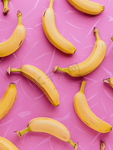 几何黄色摄影照片_粉红色背景上香蕉的几何图案