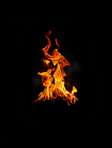 橙色电商背景摄影照片_黑暗中的火焰火焰细节黑色背景上的火焰