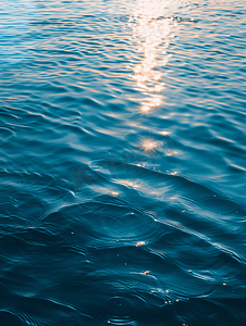 波纹理论摄影照片_有波纹和阳光反射的水面