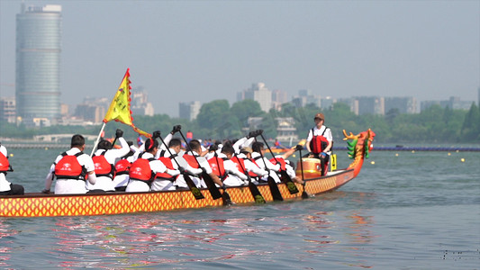 赛龙舟摄影照片_实拍端午节传统节日赛龙舟实拍
