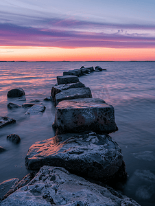 ai海草摄影照片_晚上丹麦沿海水域的石防波堤