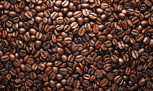 新鲜芳香的烘焙咖啡豆可用作背景