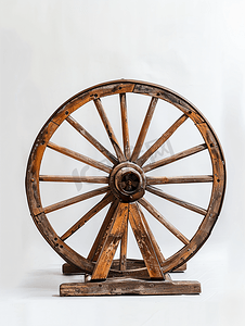 复古农民摄影照片_老式古董木质马车轮子的摘要