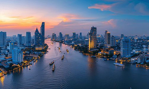 南桥夜景摄影照片_曼谷天际线和湄南河的全景夜景航拍照片