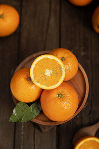 木桌上的水果橙子素材