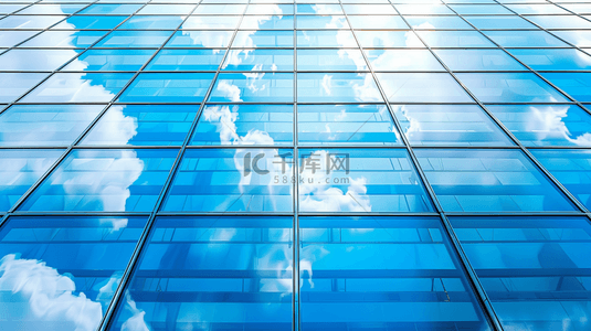蓝色写字楼背景图片_城市建设写字楼玻璃上蓝天白云的背景图
