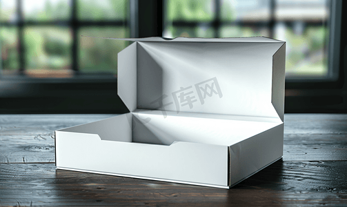深色木桌上打开白色纸板包装盒模型