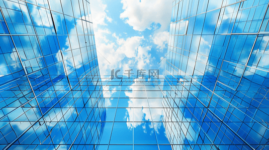 简约城市写字楼玻璃上蓝天白云的背景图