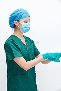 口罩医疗摄影照片_白色背景下的外科手术医疗人员形象