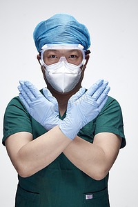 刷手衣摄影照片_穿刷手衣黛手术帽手术手套护目镜的男性医生