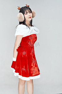 圣诞妆面摄影照片_身穿圣诞服饰的性感可爱亚洲少女