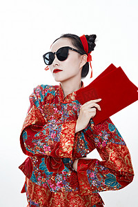 中国传统礼节摄影照片_身穿中国传统服饰的青年女性
