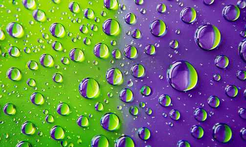 彩色艺术双色调背景紫色绿色纹理上的气泡滴