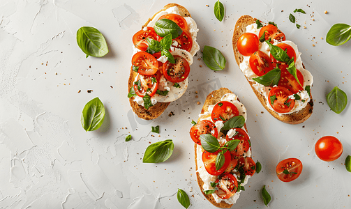 布鲁舍塔配马苏里拉西红柿和罗勒隔离在纹理背景顶视图健康饮食素食概念