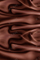 咖色巧克力浆海报背景