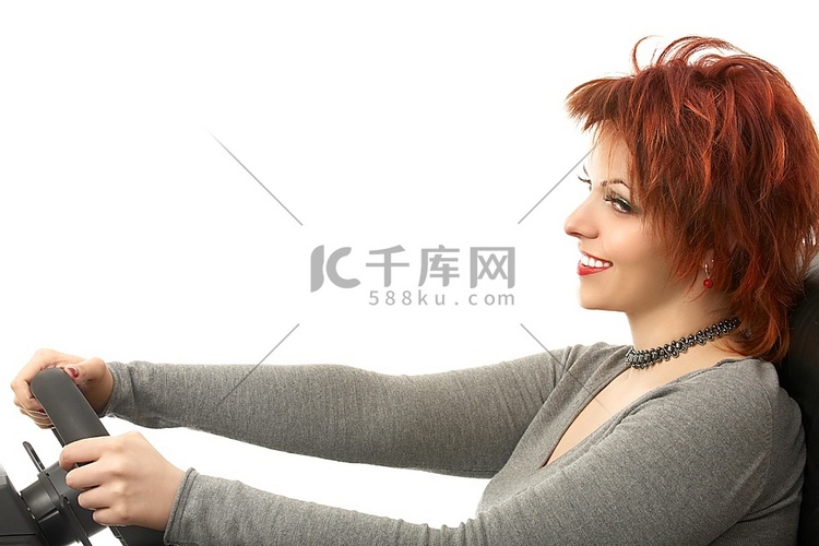 开车的女孩的侧视图自动模拟器，孤立的头发美女高清摄影大图 千库网