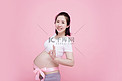 孕妇孕味照三胎孕妈咪快乐孕妇摄影图配图