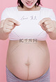 孕妈咪孕妇人像三胎三胎摄影图配图