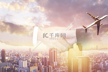 科技商务合作握手手势摄影图企业合作握手公司商务金融大气飞机