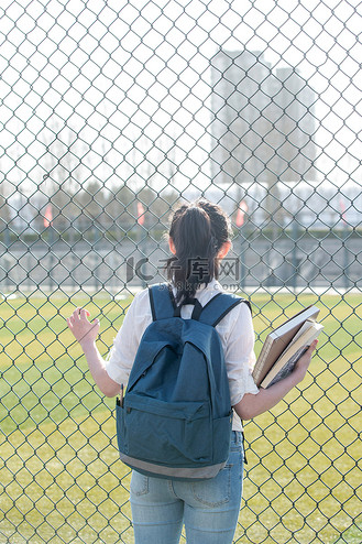 人书包背影图片素材_青年女大学生