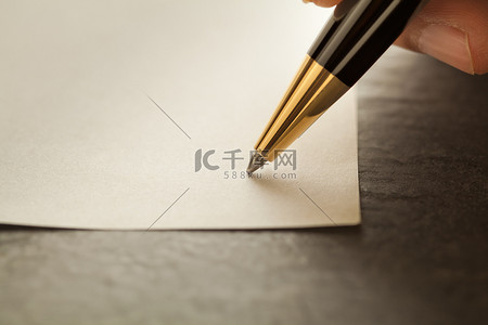 用笔写字高清摄影大图-千库网