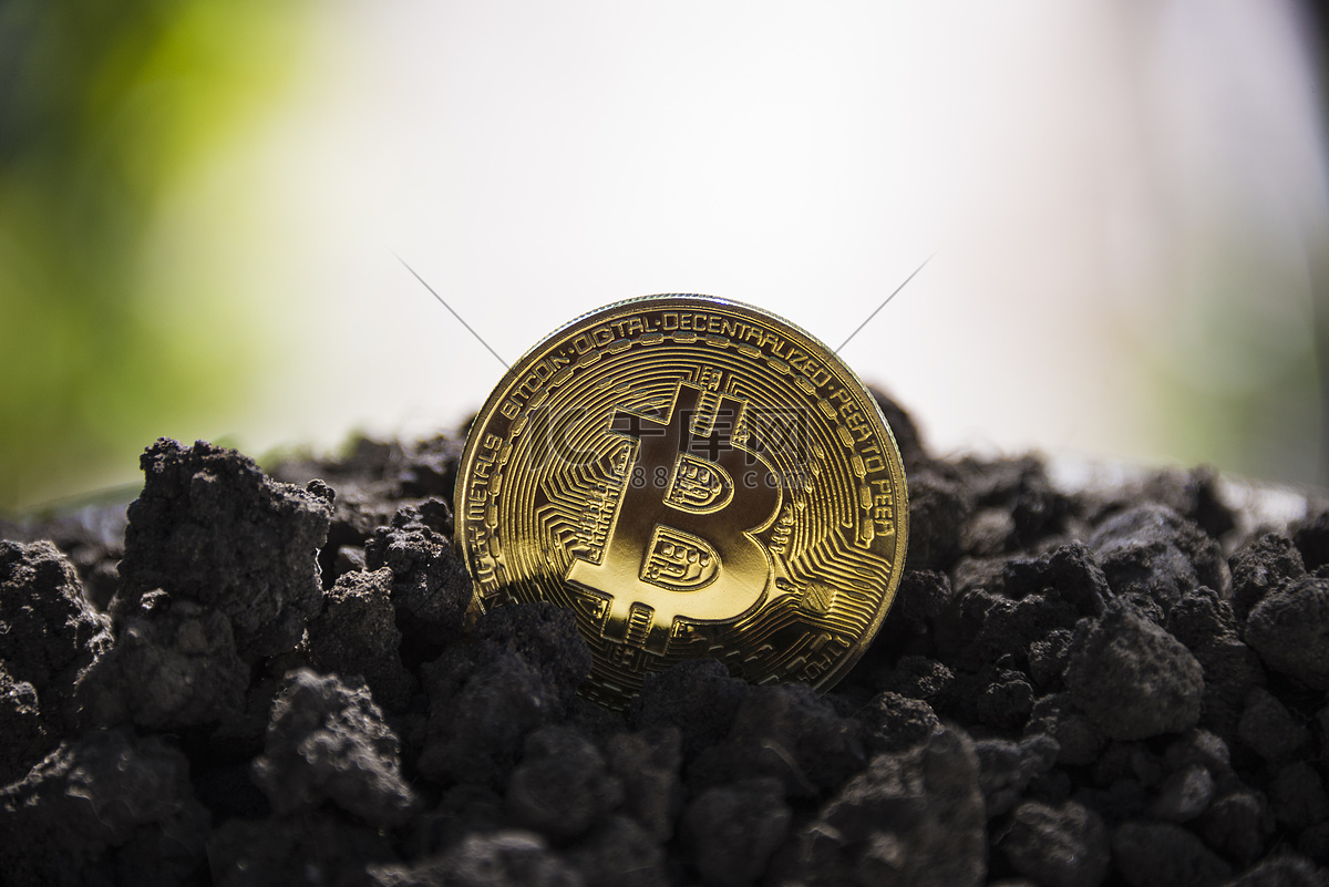 地球背景下的比特币金币高清摄影大图-千库网