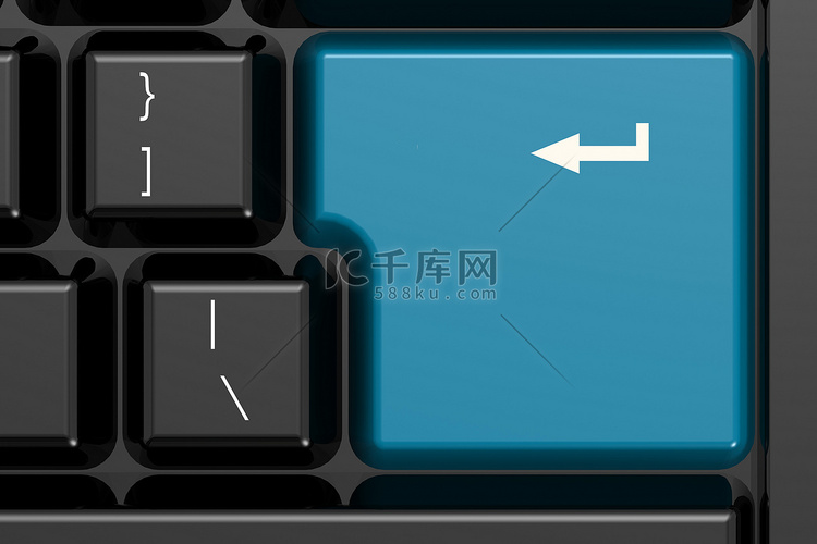 黑色键盘上的蓝色回车键高清摄影大图-千库网