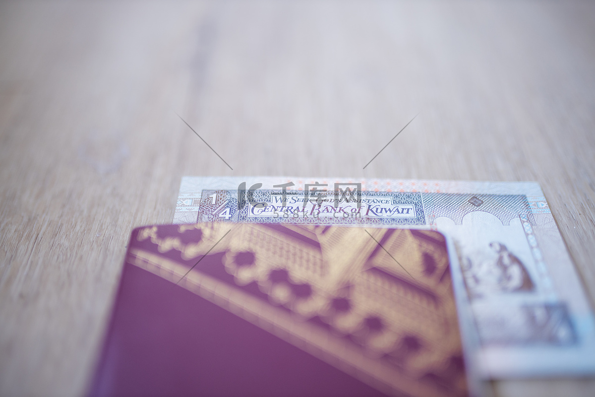 瑞典护照内有部分科威特四分之一第纳尔纸币高清摄影大图-千库网