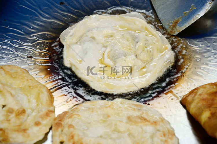 Roti fring 在一些澄清的黄油高清摄影大图-千库网