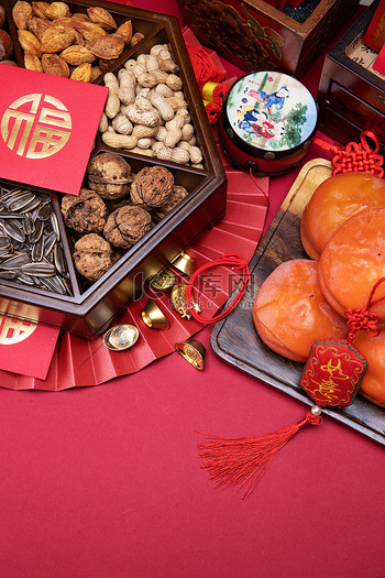 瓜子摄影图片图片素材柿子和中式坚果果盘