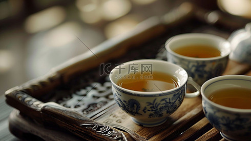 茶杯品茶木桌中国风摄影照片