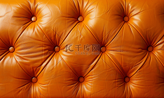 橙色复古真皮沙发扣有纹理背景