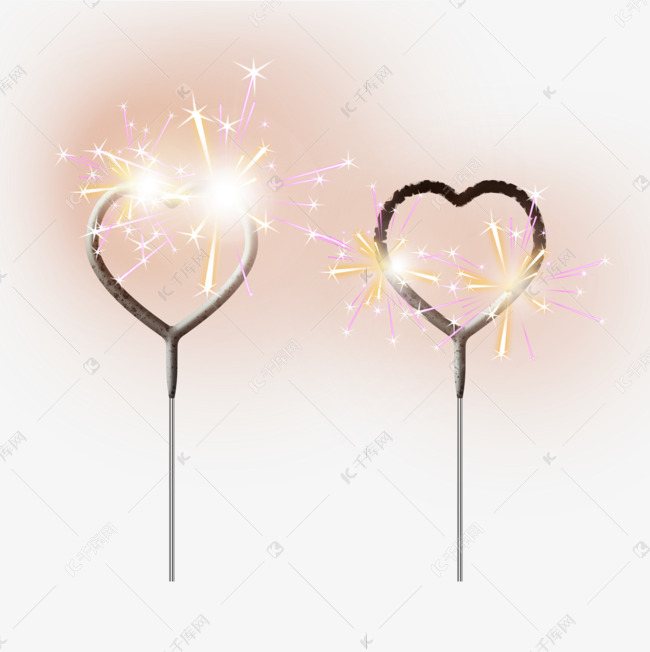 两根点燃的爱心形仙女棒烟花