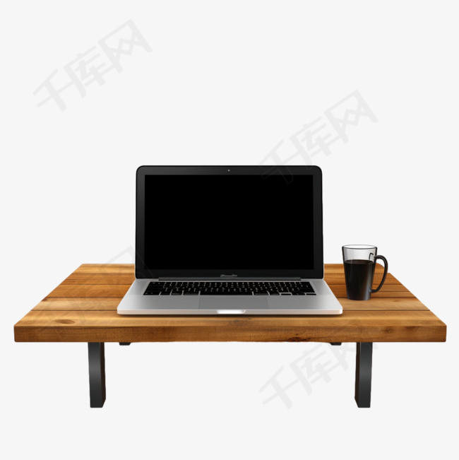 顶部有黑色笔记本电脑的棕色木桌