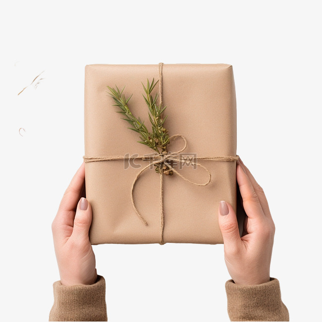 女手用纸包裹圣诞手工礼物