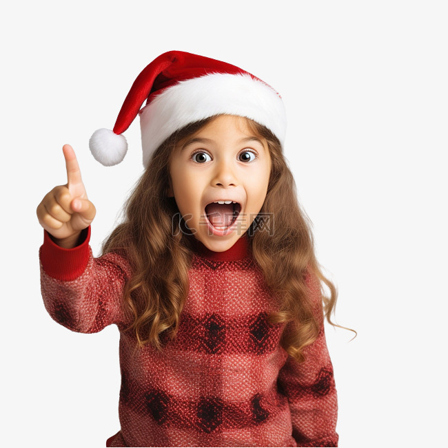 庆祝圣诞节的小女孩兴奋地用食指