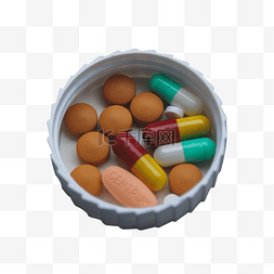 药品白色图片_白色瓷盘里的药品药片胶囊