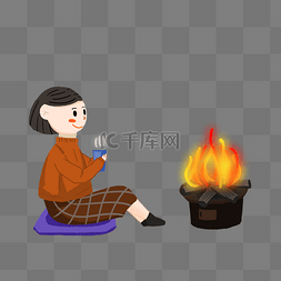 坐在的小女孩图片_冬季小女孩室内用火炉取暖