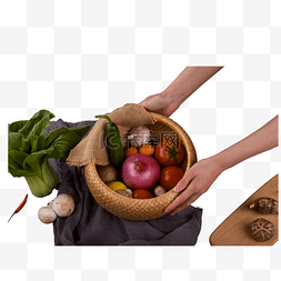 美食篮子图片_彩色手拿一篮子蔬菜元素