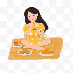 坐在垫子上吃月饼的女孩