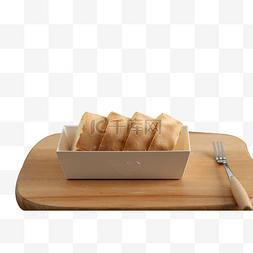 案板上纸盒里的面包