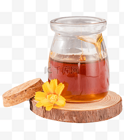 木桩蜂蜜图片_蜂蜜花蜜液体酿蜜