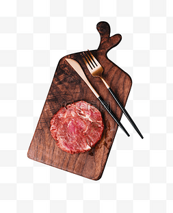 西餐美味牛排图片_木砧板的生牛排