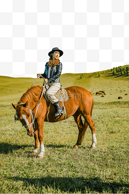 在草原上骑马的美女