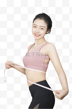 腰围健康图片_穿着瑜伽服测量腰围的人