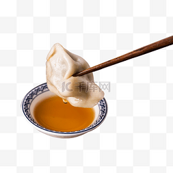 筷子夹水饺图片_筷子夹起的水饺陈醋