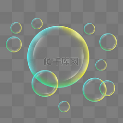 透明圆形泡泡图片_蓝黄色透明肥皂泡泡漂浮