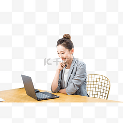 上班的白领图片_商务人像看着电脑微笑的职场人员